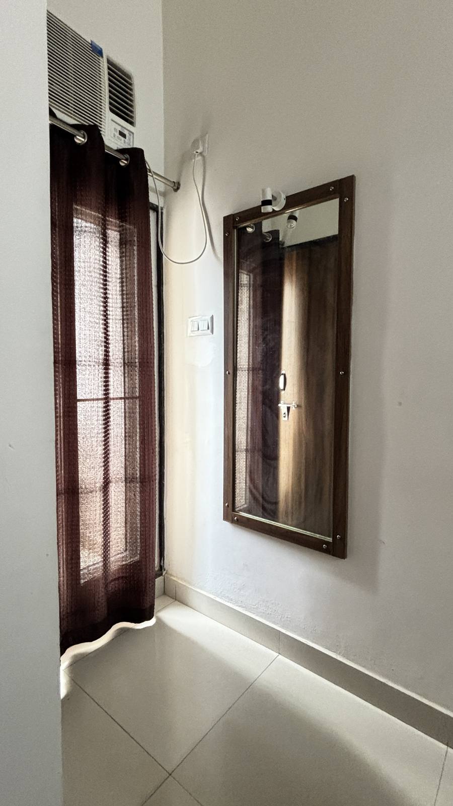Large window with wall mirror